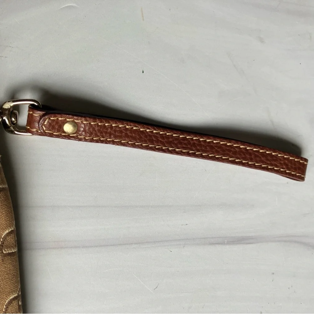 Dooney and Bourke signature logo tan leather and‎ brown monogram fabric wristlet